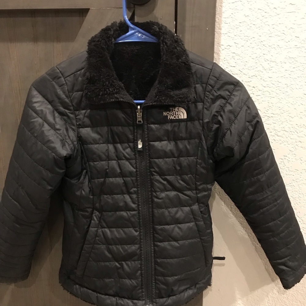 Girls  black reversible north face jacket size 7/8